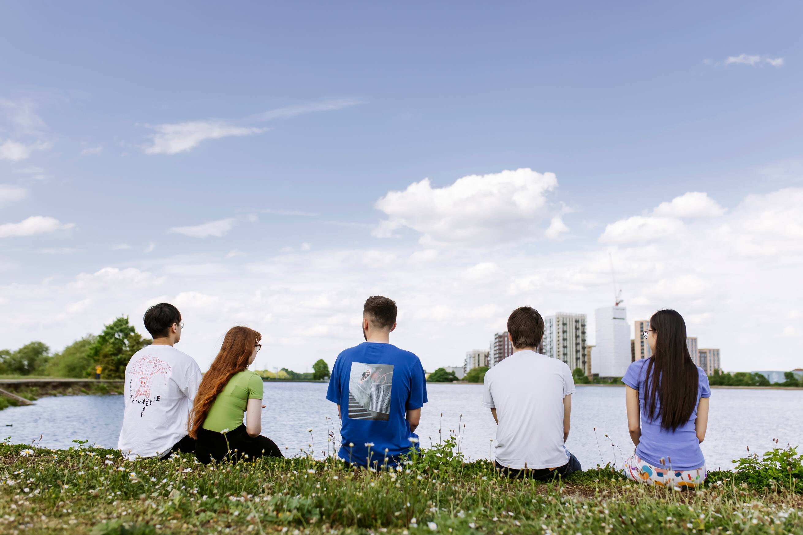 Students sitting in the nature reserve Students sitting in the nature reserve