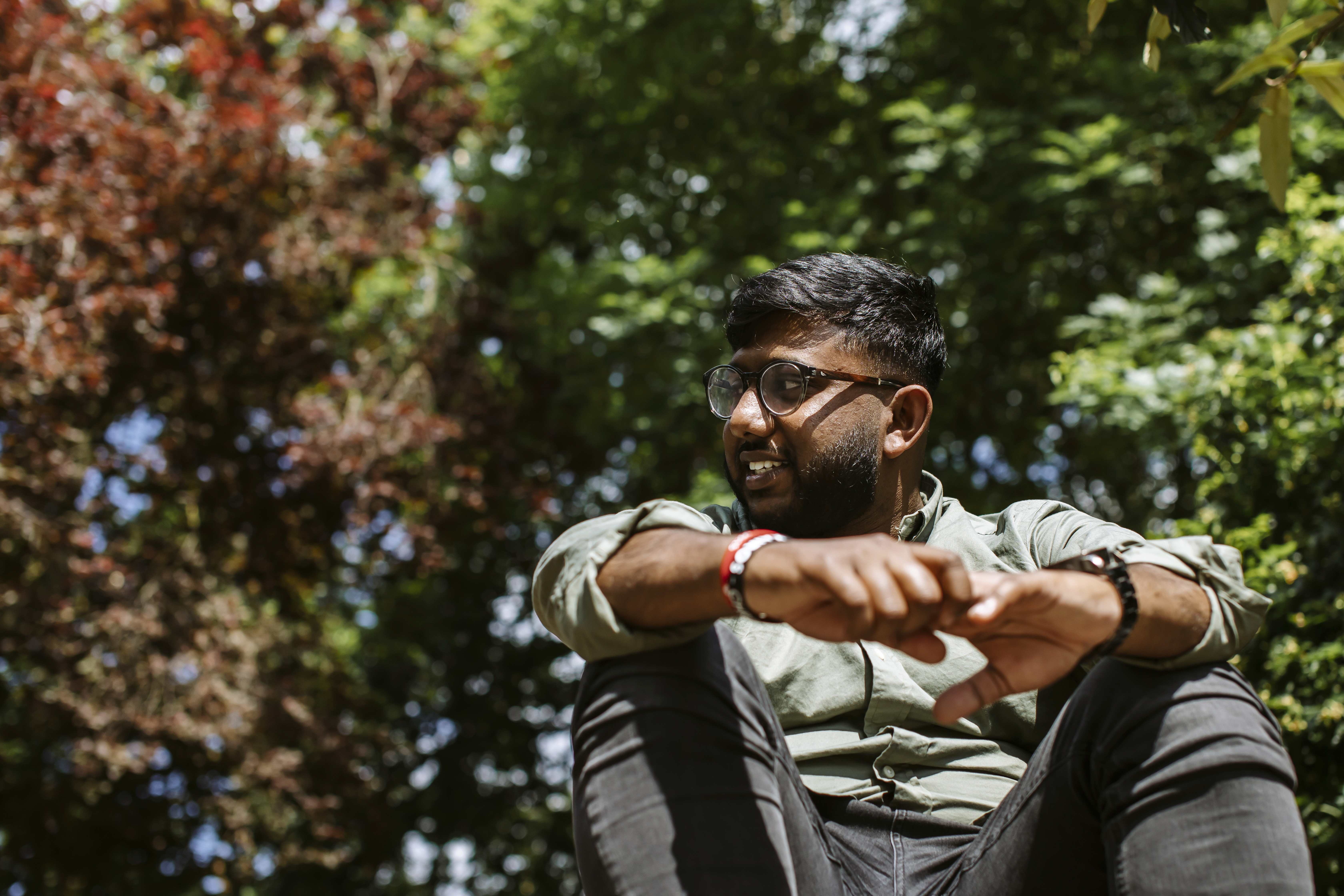 student sitting in the park